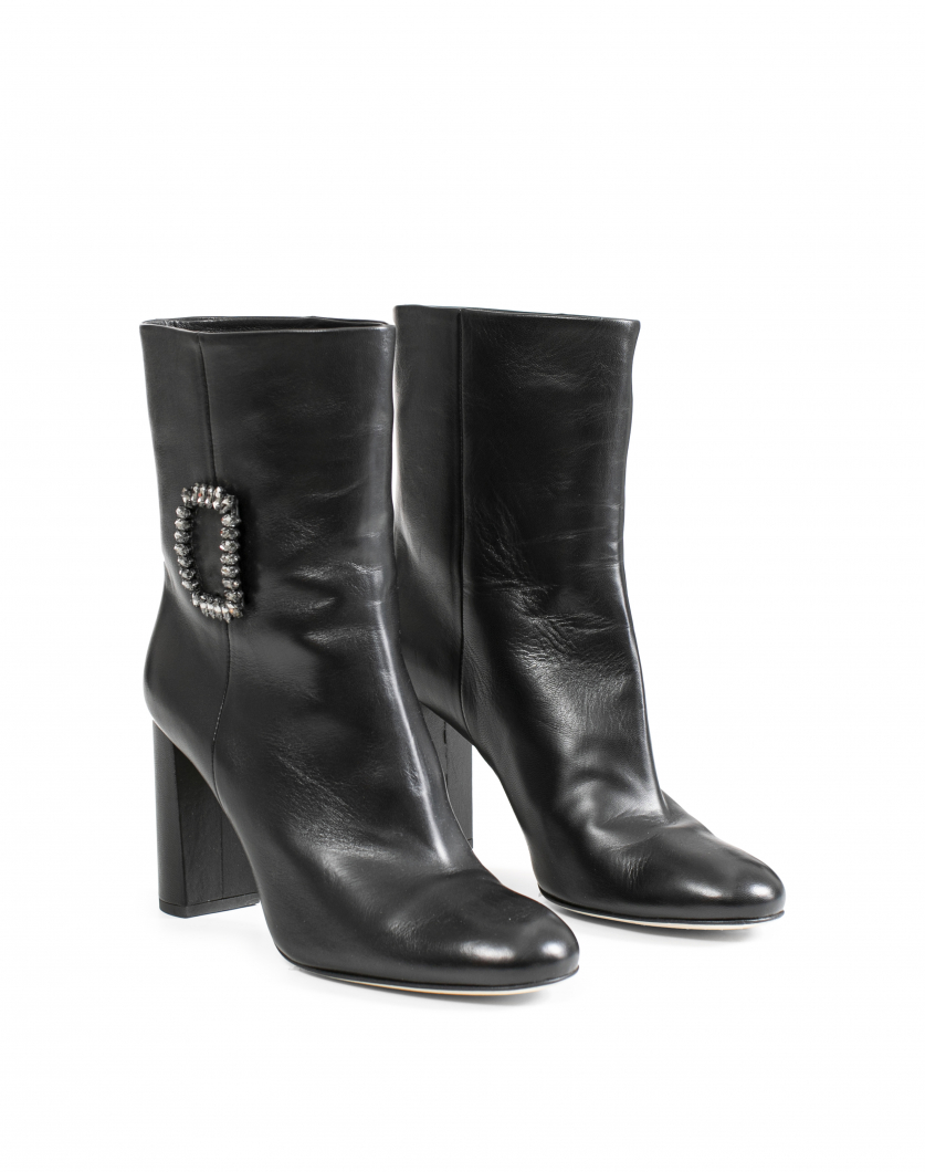 Black leather ankle boots with buckle