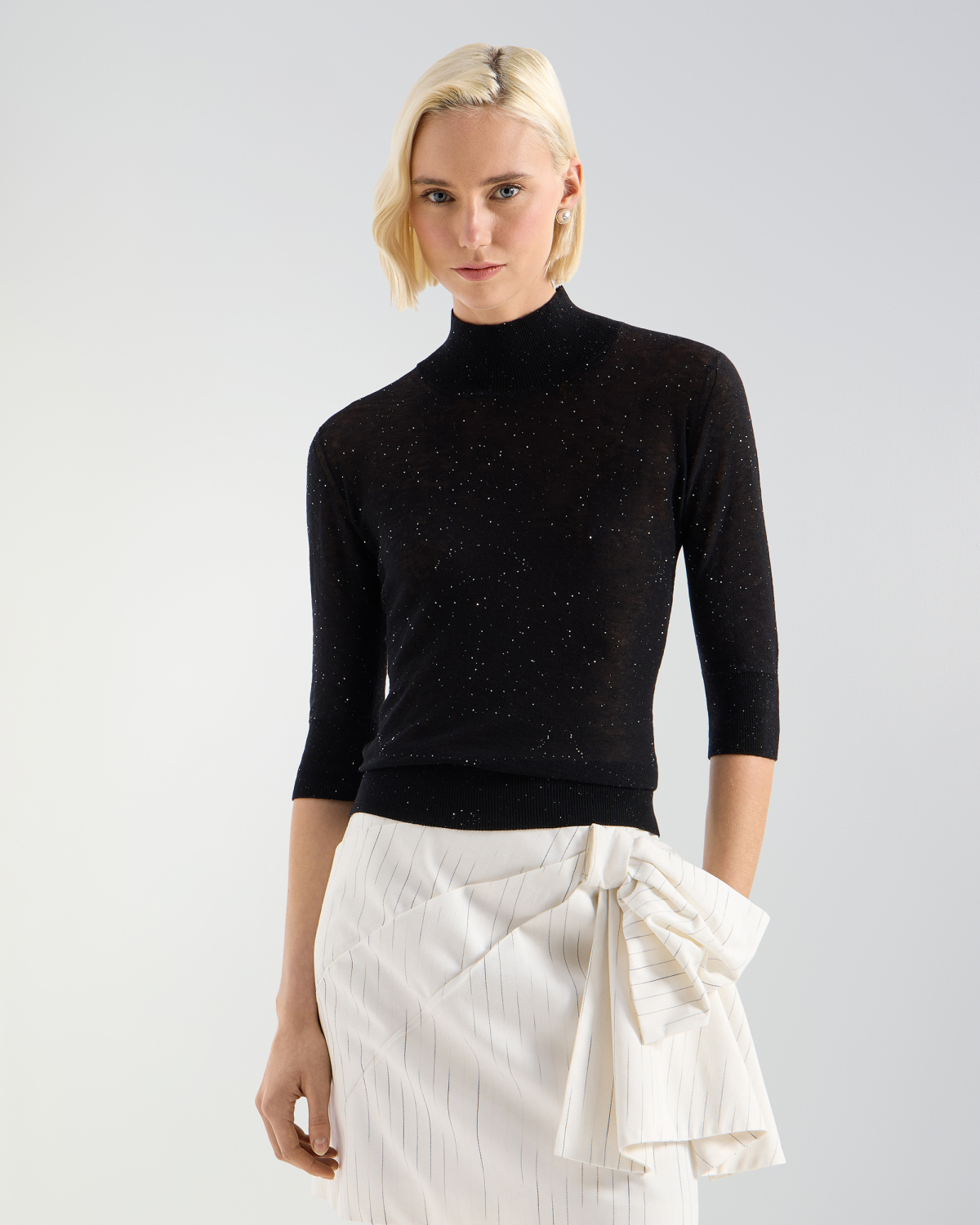 Wool turtleneck with micro sequins | Pre Fall Collection 2026-27, Knitwear | Genny