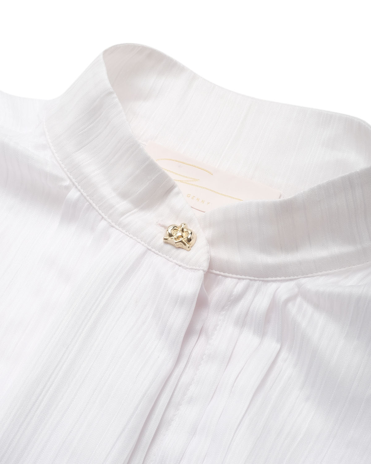 White shirt with puffball sleeves | | Genny