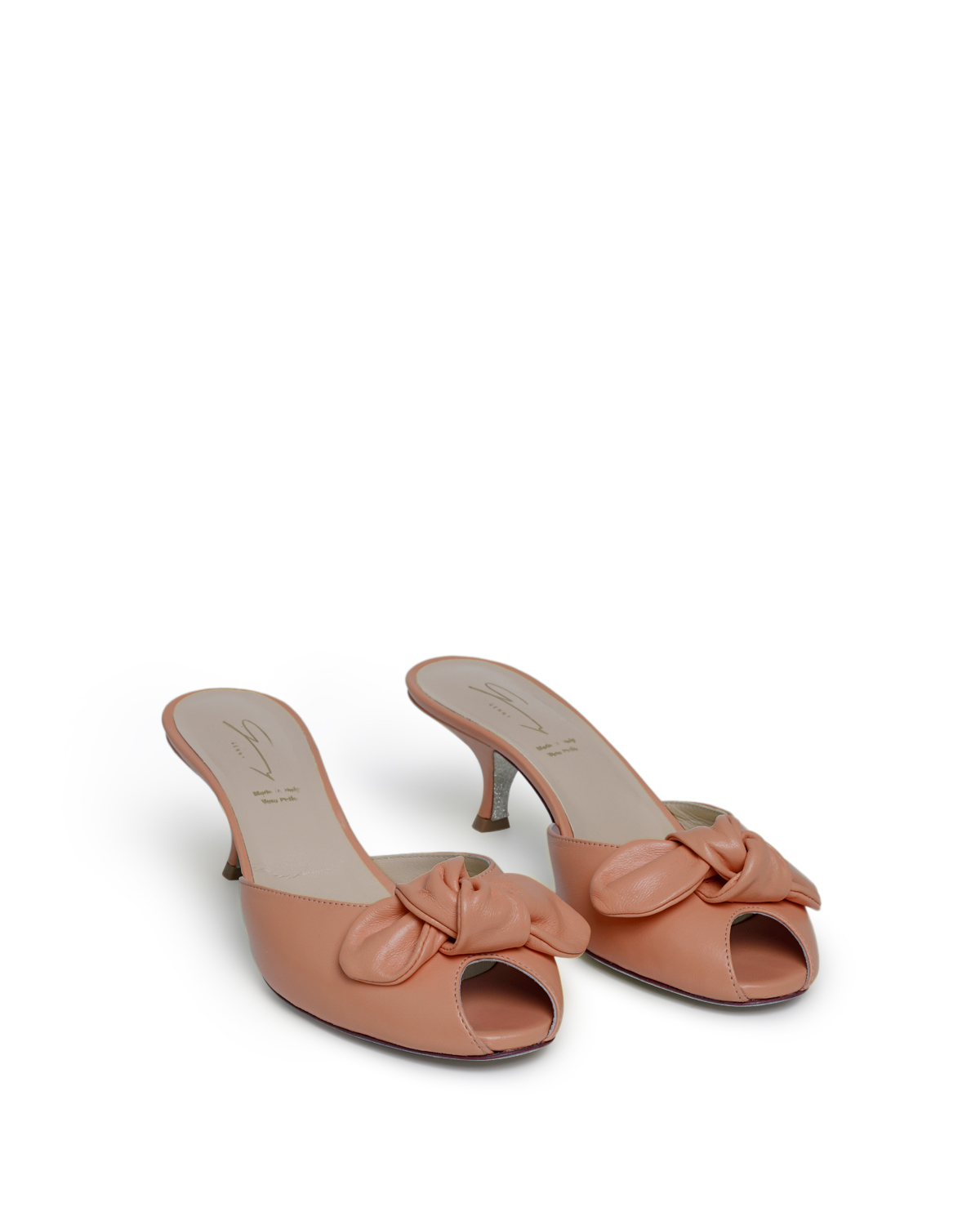 Bow-detailed pink leather mules | | Genny